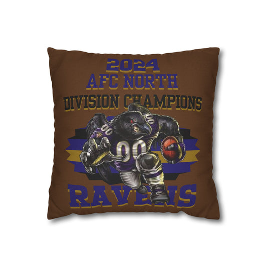 A square pillowcase with the Baltimore Ravens 2024 Division Champs design, featuring a football player and team colors.