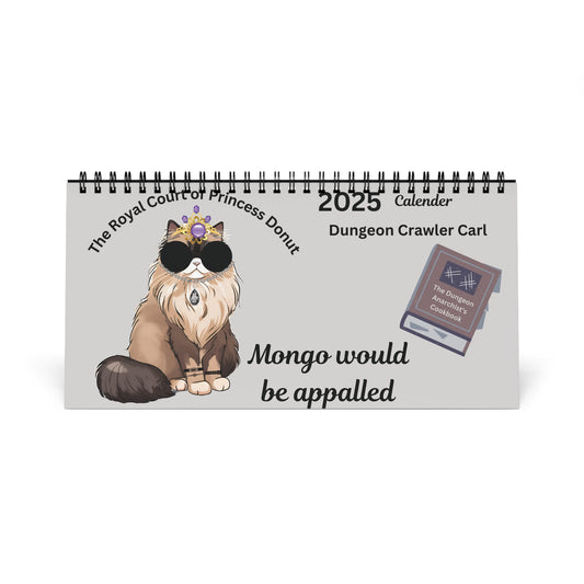 A spiral-bound desktop calendar for 2025 featuring an illustration of a character resembling a dungeon crawler with a cat, under the name 'Mongo', with a caption 'Mongo would be appalled'. The calendar is on a white background and has text indicating it's 'The Royal Code of Princess Donut'.