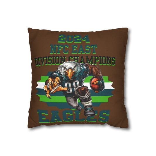 A square pillowcase with the Philadelphia Eagles 2024 Division Champs design, featuring an illustration of an eagle and text against a brown background.