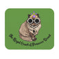 A rectangular mouse pad with a design featuring a stylized character named Carl in a royal court setting, with a green background.